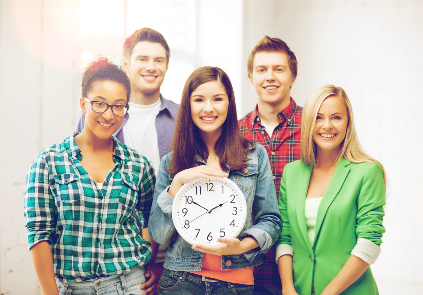 Group of five students representing education and time