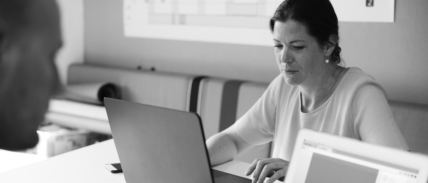 A woman working on her laptop