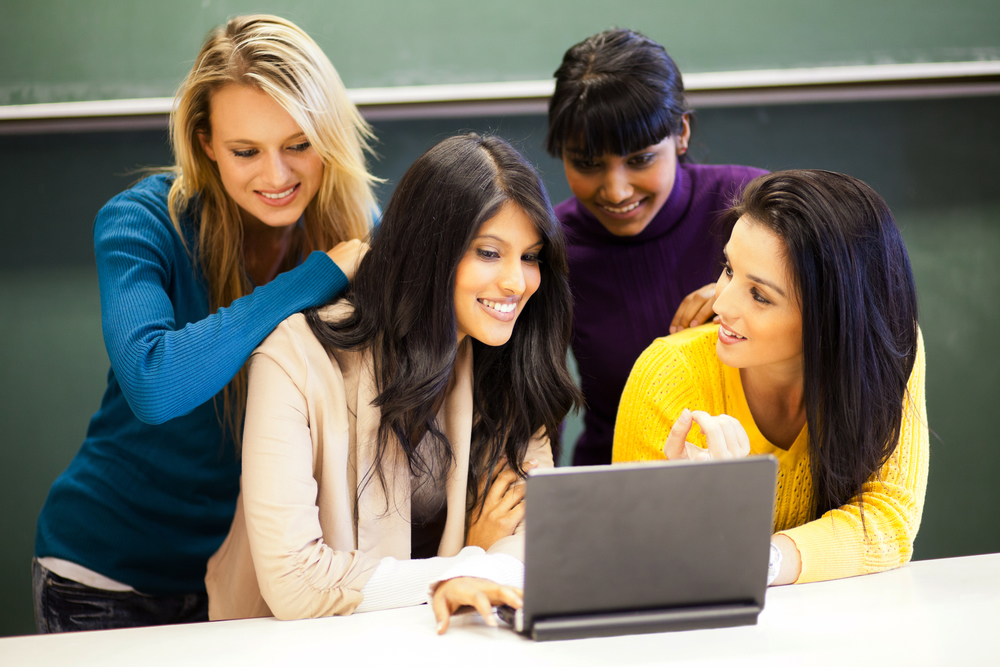 College Students With Laptop