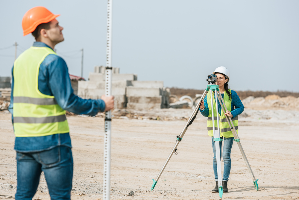 Surveyors Using Digital Level