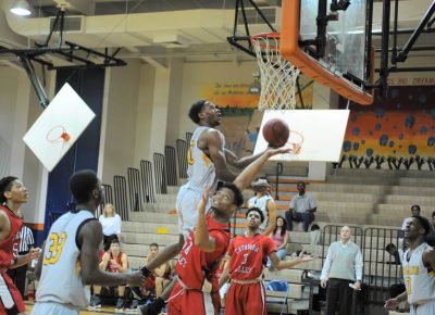 Johnny Hughes drives to the basketball during a FTCC basketball game