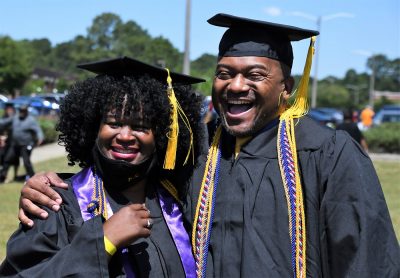 040 Two Graduates Beam After The Ceremony