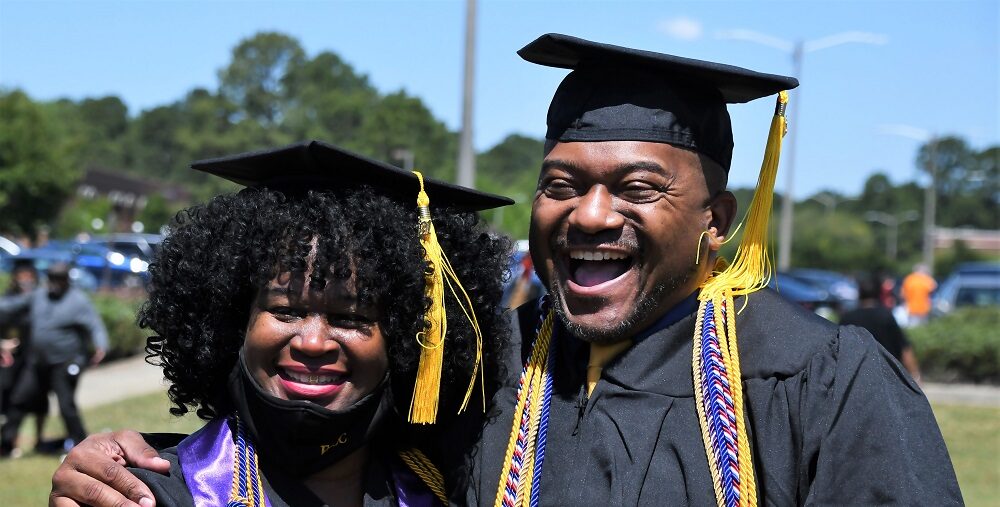 040 Two Graduates Beam After The Ceremony