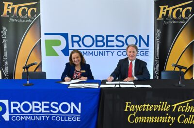Robeson CC President Melissa Singler and FTCC President Mark Sorrells Sign A Regional Partnership Agreement