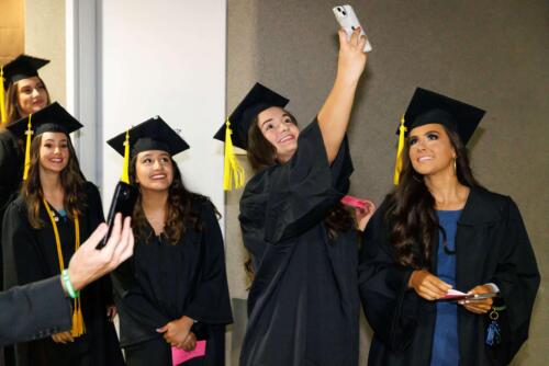 Graduates-smile-for-a-selfie