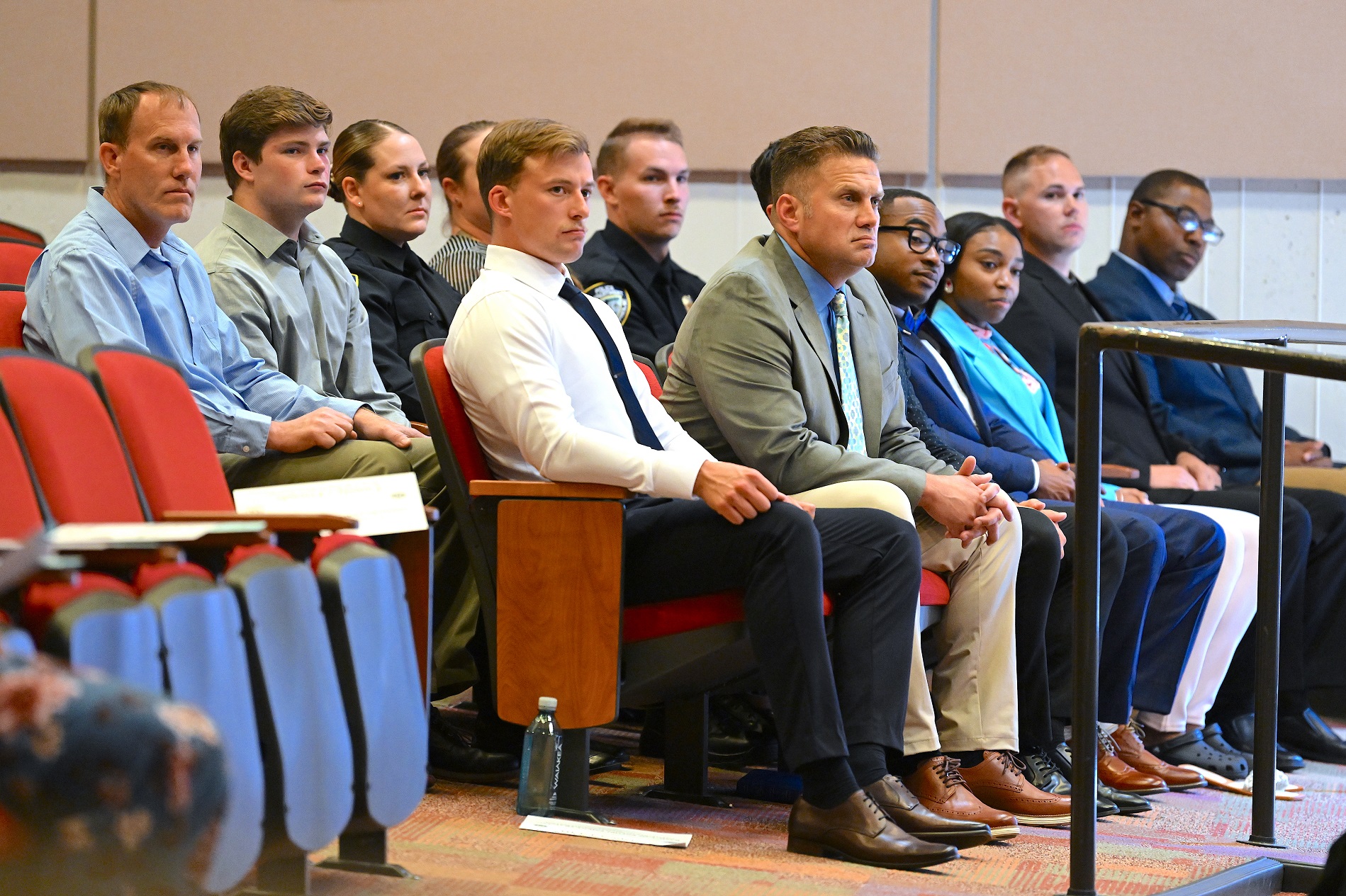 Graduates of FTCC's Basic Law Enforcement Training sit at graduation.