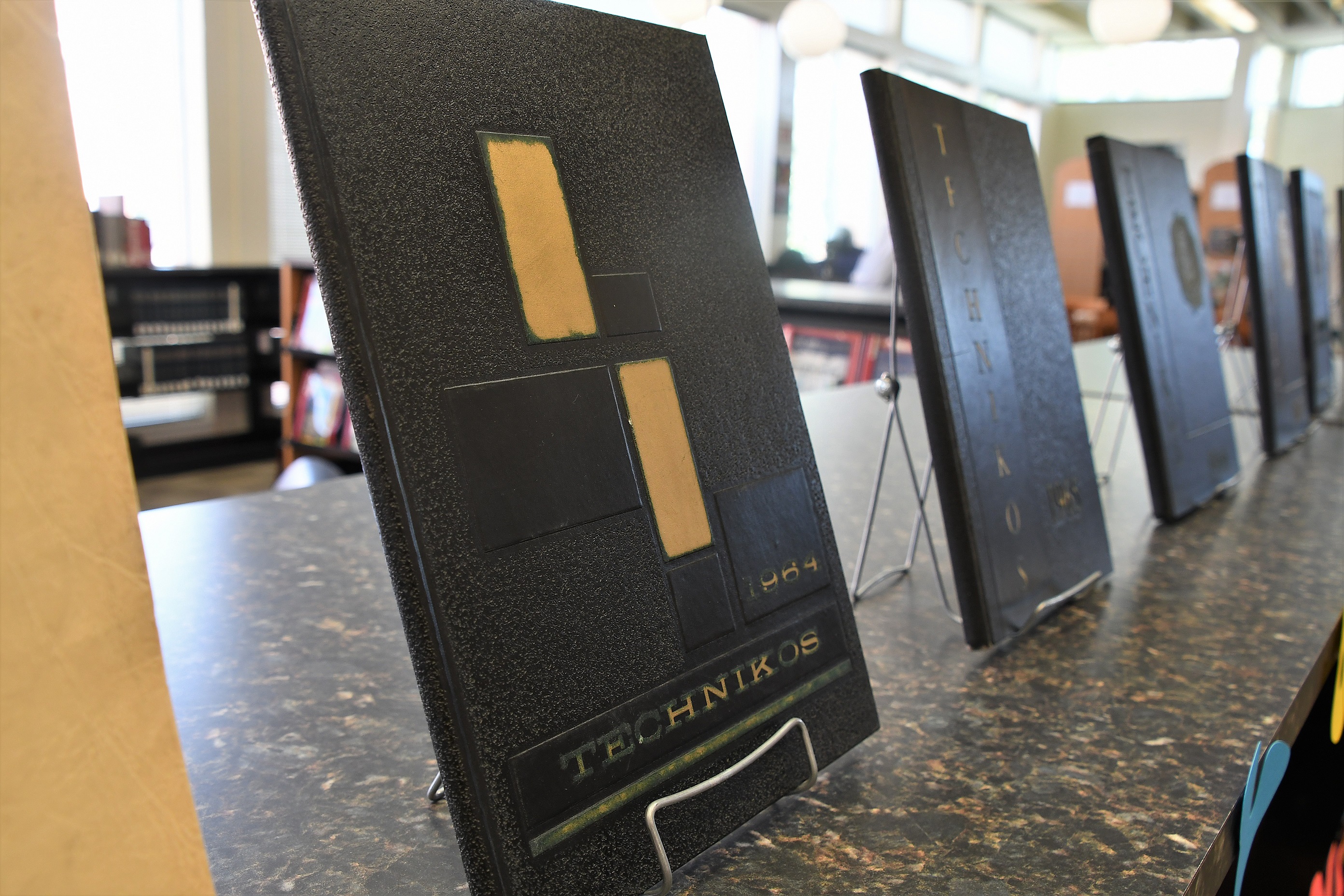 FTCC yearbooks from the 1960s on display on the a shelf in the library.